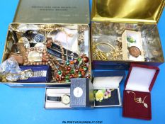 A quantity of costume jewellery to include faux pearls, watches,