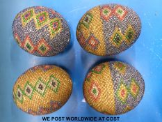 Four ostrich eggs,