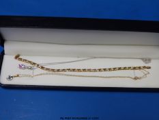 A 9ct bi-coloured gold bracelet,