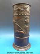 A copper stick or similar stand signed A.