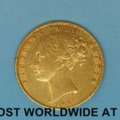 An 1861 young head gold full sovereign shield reverse
