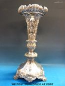 A large plated single epergne raised on three scrolling feet,