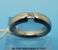A platinum ring set with a princess cut diamond (size I)