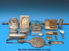 A quantity of hallmarked silver items to include cigarette box, two mirrors, Victorian caddy spoon,