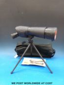 An Optus Zoom 20-60x60 spotting scope with table tripod instructions and soft case
