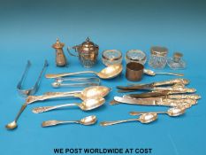 A quantity of hallmarked silver items to include Georgian sugar tongs, Mappin & Webb mustard,