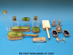 A seven-piece green guilloché enamel dressing table set,