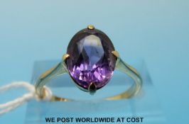 A 9ct gold ring set with an oval amethyst measuring approx 2.