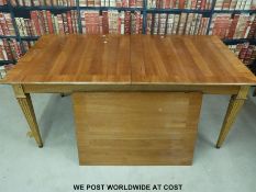 A modern possibly yew or cherrywood table with cross banded decoration and extra leaf (height 75cm