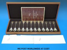 A cased set of 12 hallmarked silver RSPB bird spoons 320g