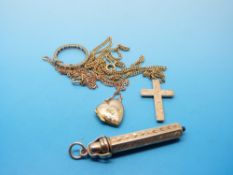 A yellow metal pencil with chased decoration, two 9ct gold chains,