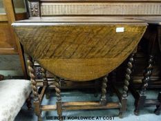 Two oak drop leaf tables,
