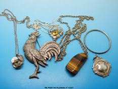 A quantity of silver jewellery to include brooches, a fob, a cockerel brooch,