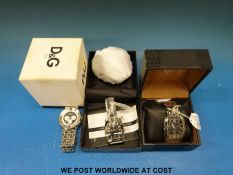 A D&G Time wristwatch together with two Guess watches,