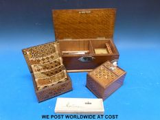 A brass-bound oak cigar box and contents to include piercer (S Mordan hallmarked silver) cigars etc