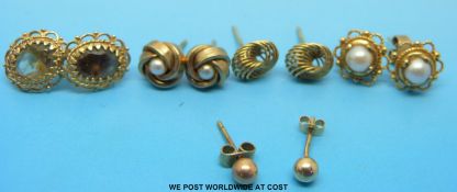 Five pair of earrings to include two 9ct gold pairs set with pearls and a yellow metal pair set