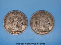 Two 5 franc silver coins,