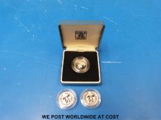 Three £1 silver proof coins
