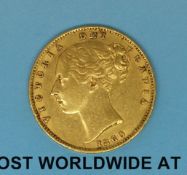 An 1860 young head gold full sovereign shield reverse