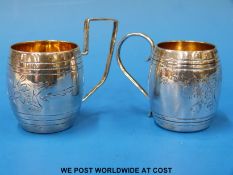 Two Russian white metal drinking cups,