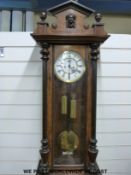 Two train Vienna regulator with weights,