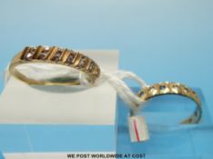 Two 9ct gold rings one set with clear stones and the other blue and clear stones (bag 25)