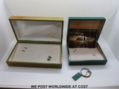 Two wooden/leather covered Rolex wristwatch boxes,
