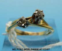 Two 18ct gold rings set with a round brilliant cut diamonds
