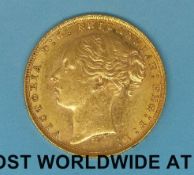 An 1879 young head gold full sovereign, type 2 reverse,