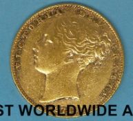 An 1871 young head gold full sovereign, shield back, die no 11,