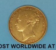 An 1872 young head gold full sovereign shield reverse,