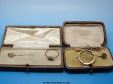 A gold stick pin set with seed pearls in an Asprey box,  gold stick pin set with a turquoise,