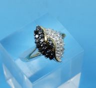 A 9ct gold ring set with sapphires (size N)