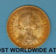 A 1958 cased gold full sovereign