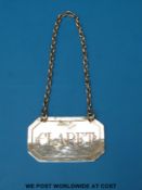 A probably Georgian silver Claret bottle label, stamped twice with the maker's mark RK,