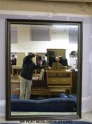 A large framed mirror (40in x 53in),