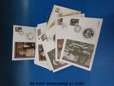 Eight commemorative five pound UK coins, most with first day cover stamps and certificate,