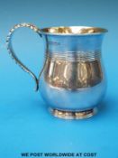 A Victorian hallmarked silver, baluster-shaped Christening mug with gilt wash interior,