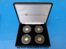 A cased 'Jubilee Mint' limited edition solid gold coin collection comprising four commemorative