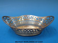 A Dutch white metal pierced basket, with Dutch silver marks (length 16cm,