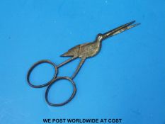 A pair of late 18th/ early 19thC scissors in the form of a stork believed to be umbilical cord