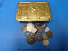 A Christmas 1914 WWI Queen Mary tin containing 18thC tokens etc, a William IV half crown,