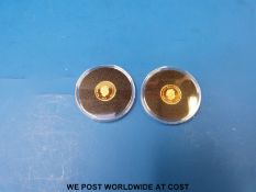 A WWI miniature commemorative miniature gold coin together with another in cases with certificates