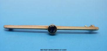 A 15ct gold brooch set with a sapphire