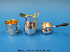 A Victorian hallmarked silver three-handled loving cup with gilt wash interior, Ldn 1900,