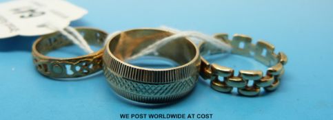 Three 9ct gold rings, one in Celtic design (12.