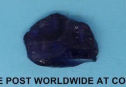 A loose rough amethyst measuring 55ct