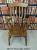 An elm seated Windsor armchair.