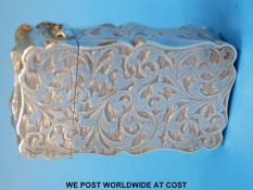 A Victorian hallmarked silver card or similar case with gilt wash interior and engraved decoration,