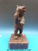 A late 19th/early 20thC Black Forest bear on plinth (height 32cm)